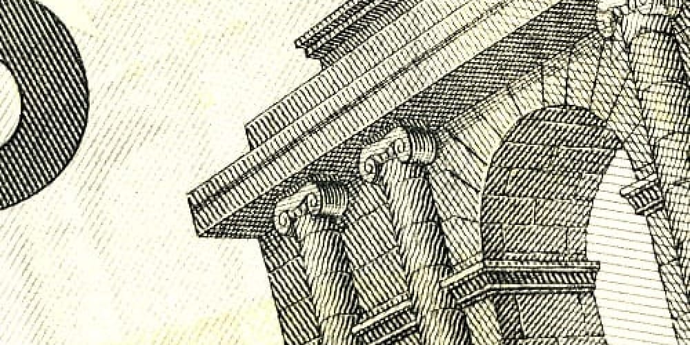 Close-up engraving of U.S. dollar bill representing financial fraud prevention